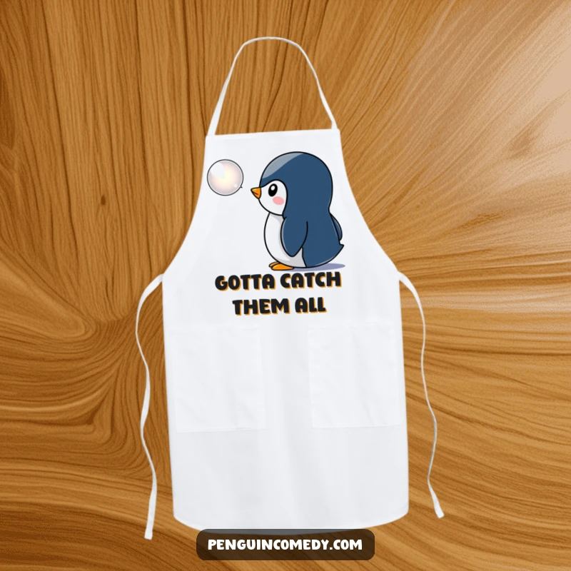 Funny penguin apron, showing a curious penguin watching a shimmering bubble icon, perfect for a humorous and functional kitchen statement.