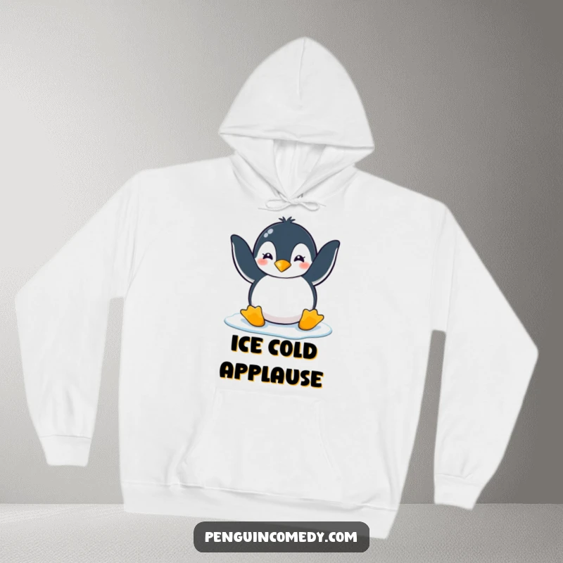 Funny penguin clapping playfully with flippers on ice, designed for a cozy and funny hoodie gift.