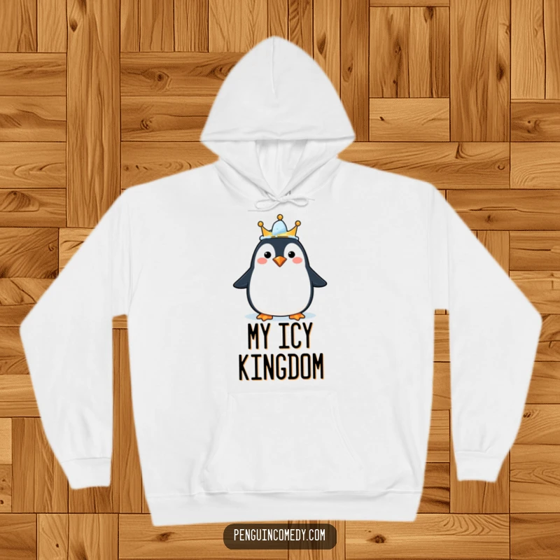 Funny hoodie with a happy penguin sporting an ice crown, providing warmth and humor, a gift.