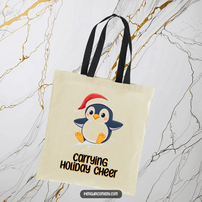 Funny tote bag depicting a cheerful penguin in a Santa hat enjoying a thrilling slide down a snowy slope.